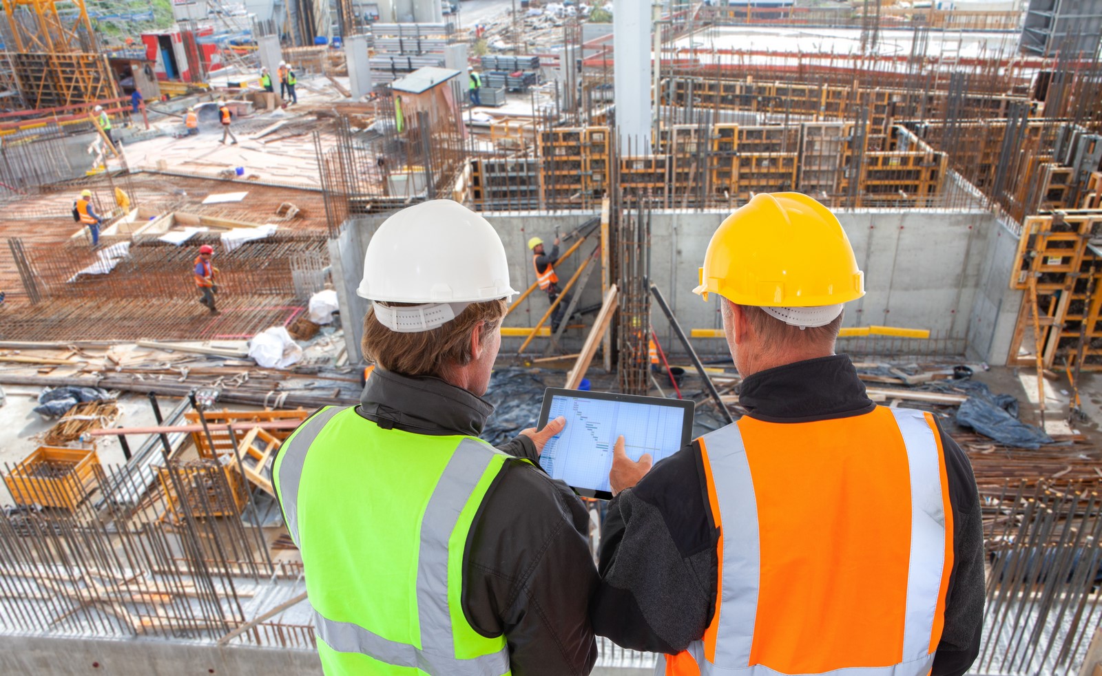 construction worker engineer architect team at work on major co